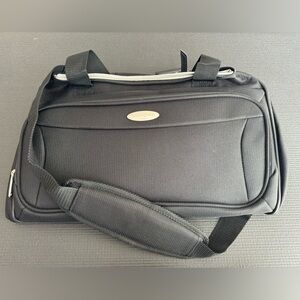 Samsonite black duffel bag